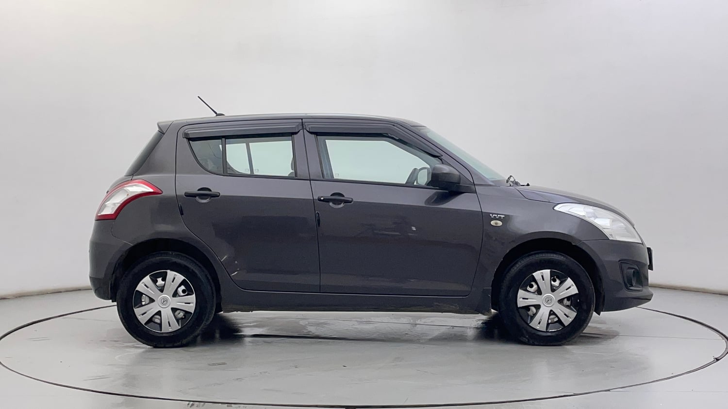 Used 2016 Maruti Suzuki Swift Lxi (O) Petrol Manual exterior RIGHT SIDE VIEW