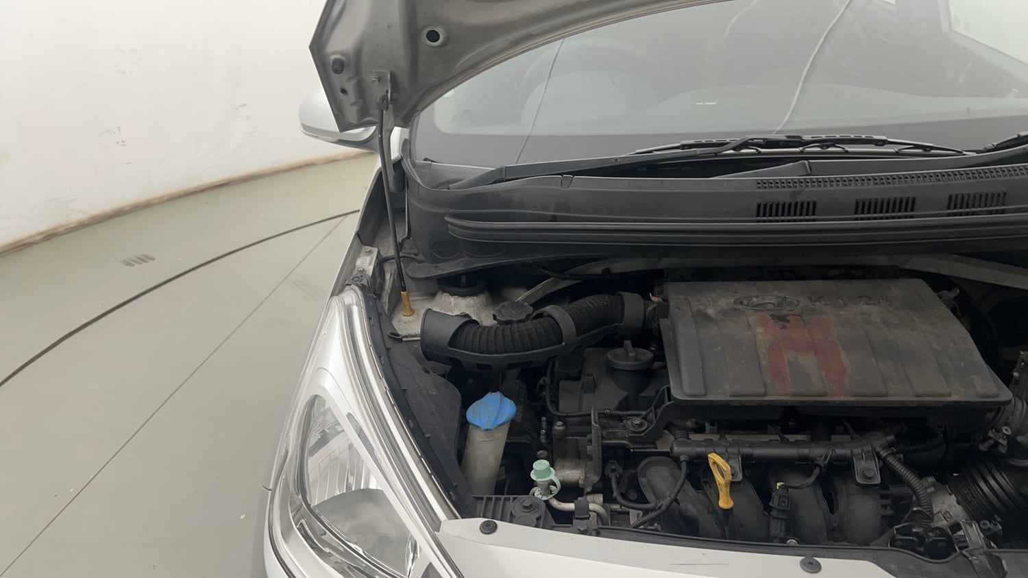 Used 2014 Hyundai Grand i10 Sportz 1.2 Kappa VTVT Petrol Manual engine ENGINE RIGHT SIDE HINGE & APRON VIEW