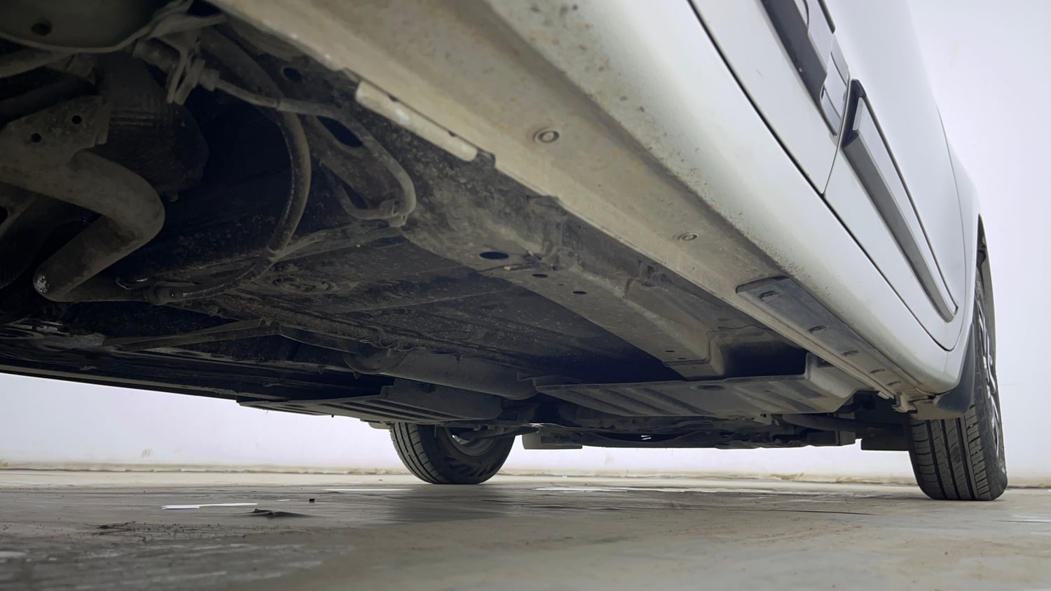 Used 2022 Maruti Suzuki Swift VXi AMT Petrol Automatic extra REAR RIGHT UNDERBODY VIEW