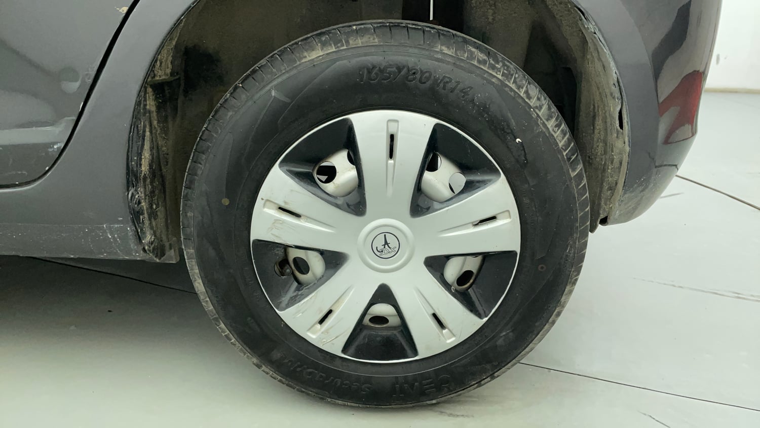 Used 2016 Maruti Suzuki Swift Lxi (O) Petrol Manual tyres LEFT REAR TYRE RIM VIEW