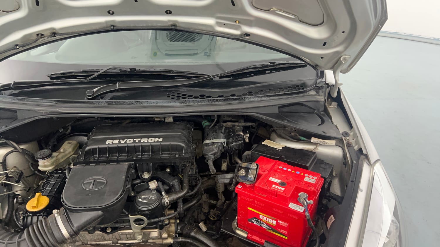 Used 2018 Tata Tiago Revotron XZ Petrol Manual engine ENGINE LEFT SIDE HINGE & APRON VIEW