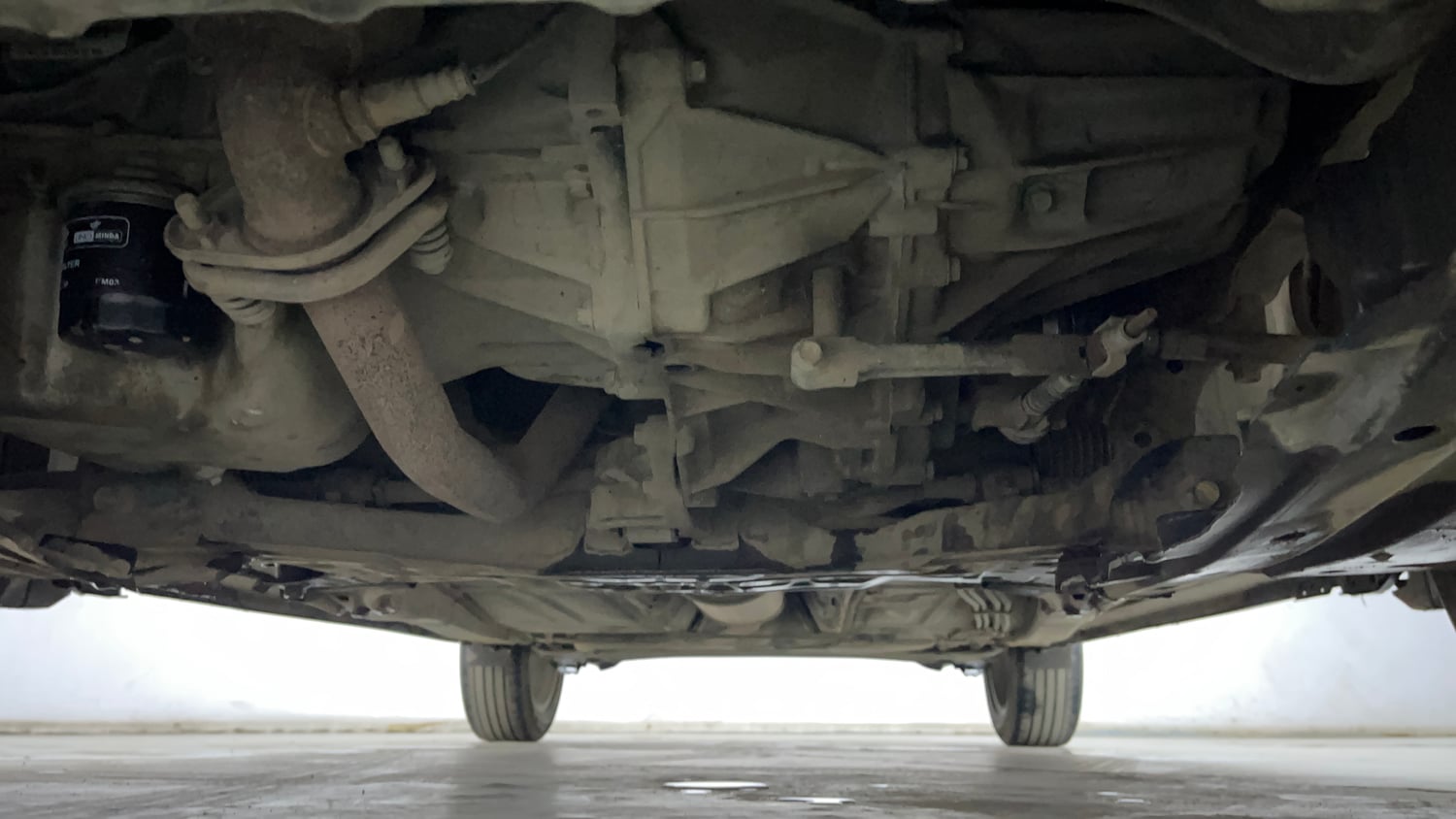 Used 2022 Maruti Suzuki Baleno Zeta Petrol Manual extra FRONT LEFT UNDERBODY VIEW