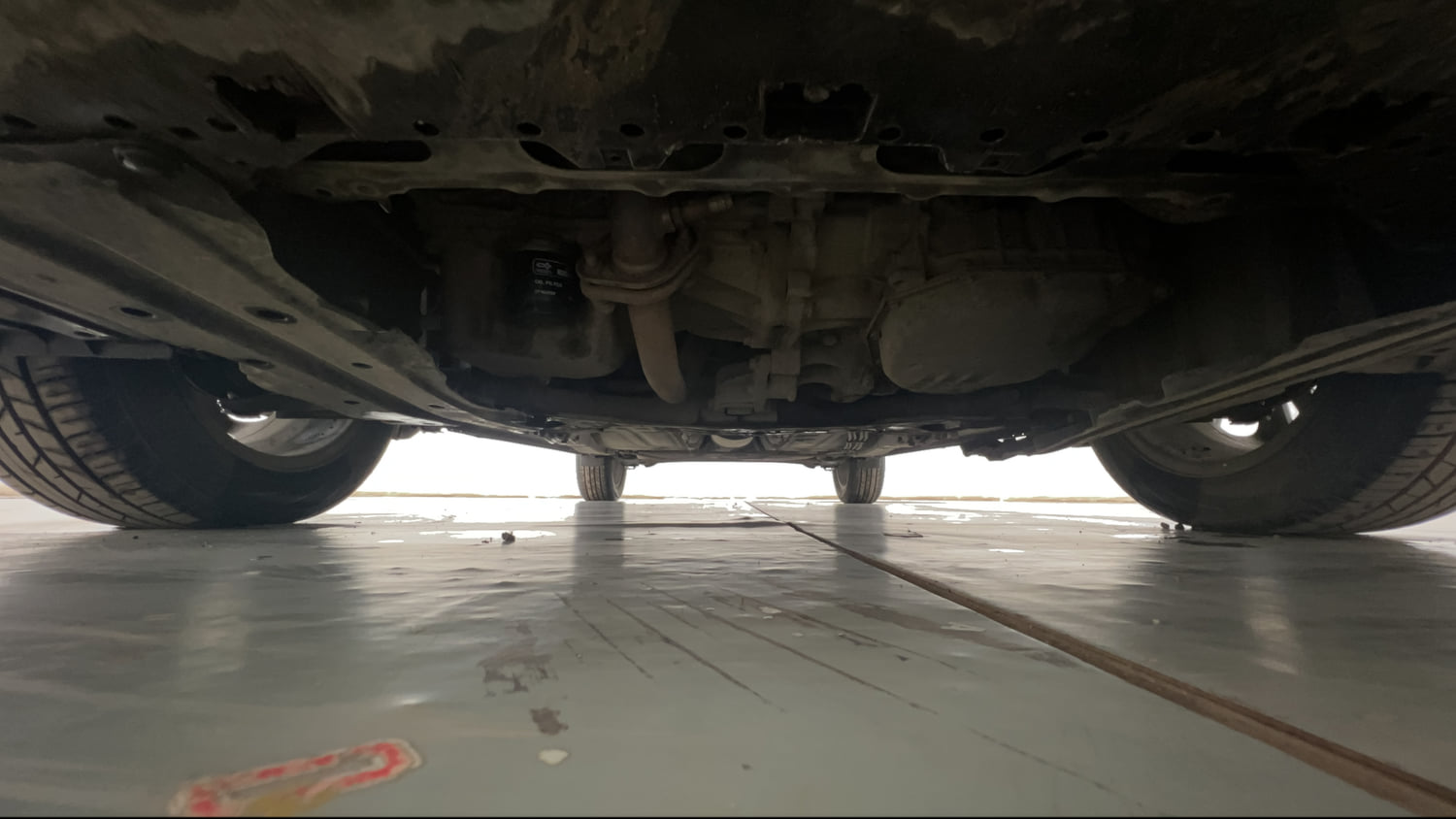 Used 2020 Maruti Suzuki Baleno Zeta Automatic Petrol Automatic extra FRONT LEFT UNDERBODY VIEW