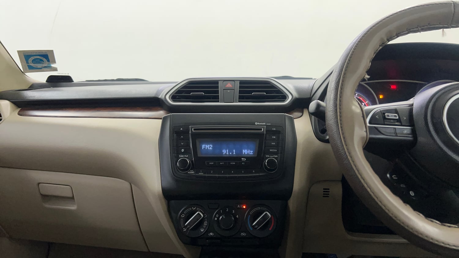 Used 2019 Maruti Suzuki Dzire VXi Petrol Manual interior MUSIC SYSTEM & AC CONTROL VIEW