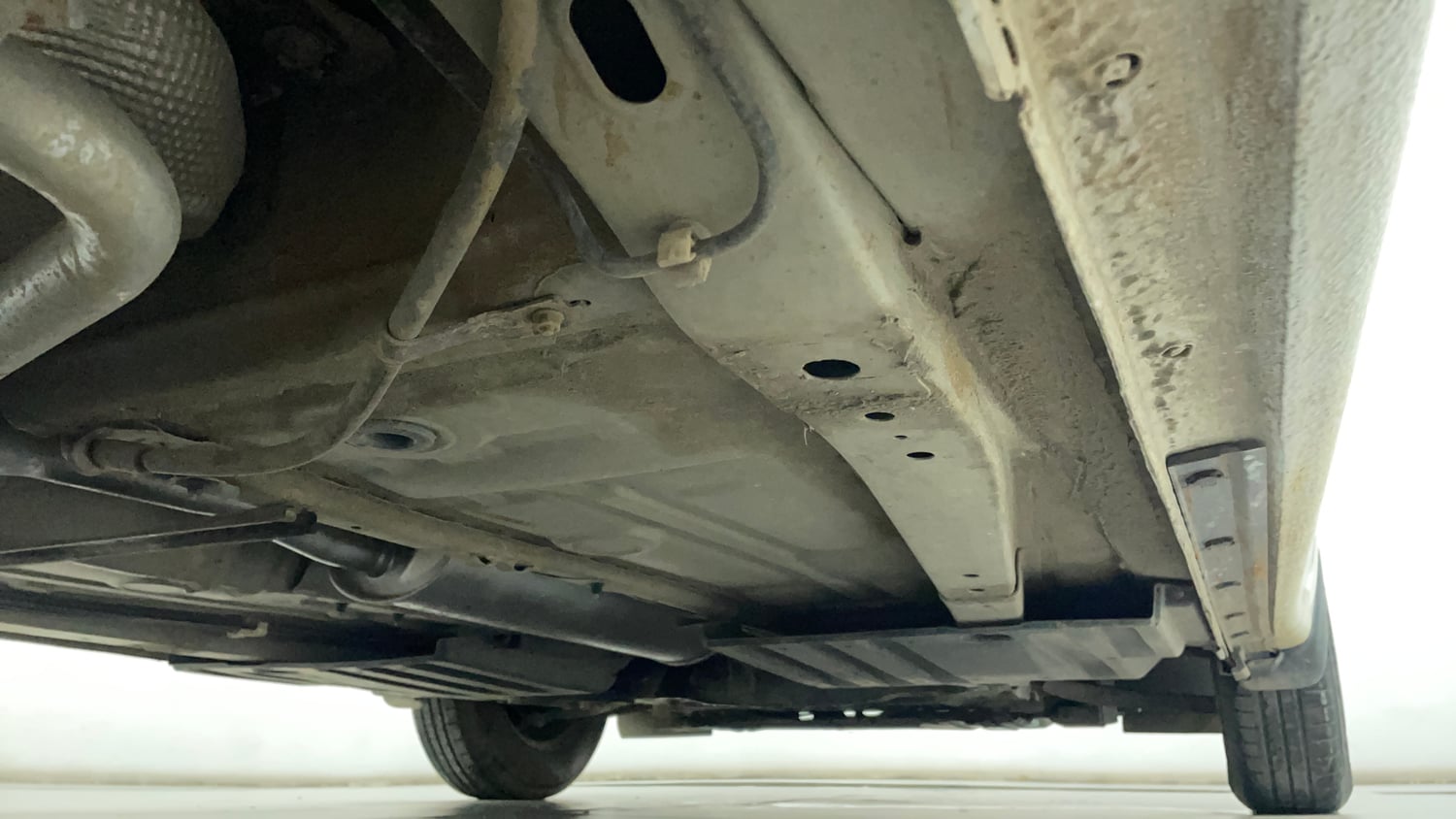 Used 2021 Maruti Suzuki Dzire VXi Petrol Manual extra REAR RIGHT UNDERBODY VIEW