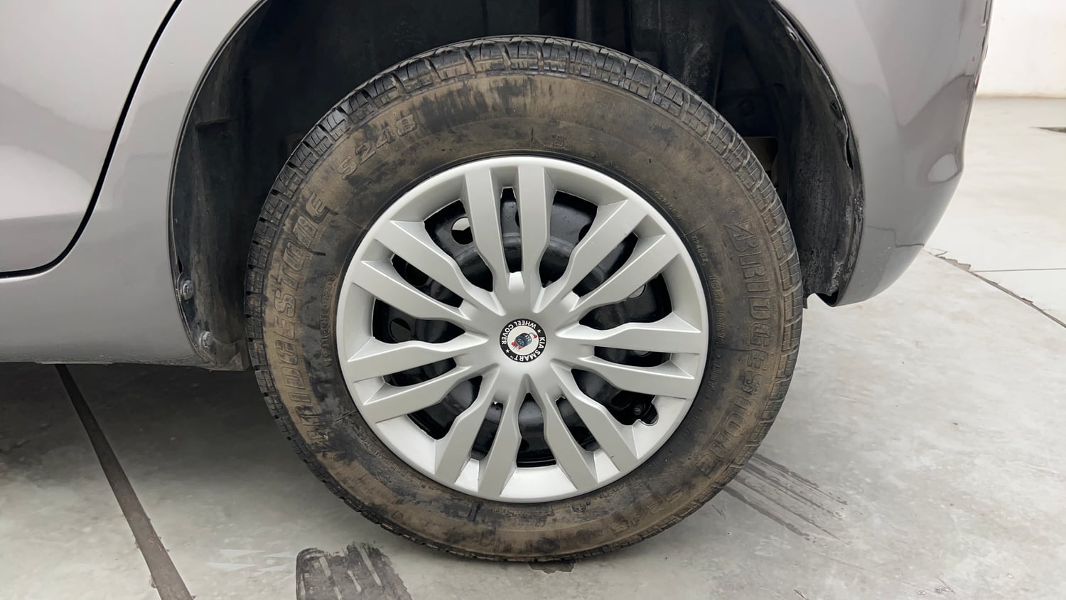 Used 2013 Maruti Suzuki Swift VXi Petrol Manual tyres LEFT REAR TYRE RIM VIEW