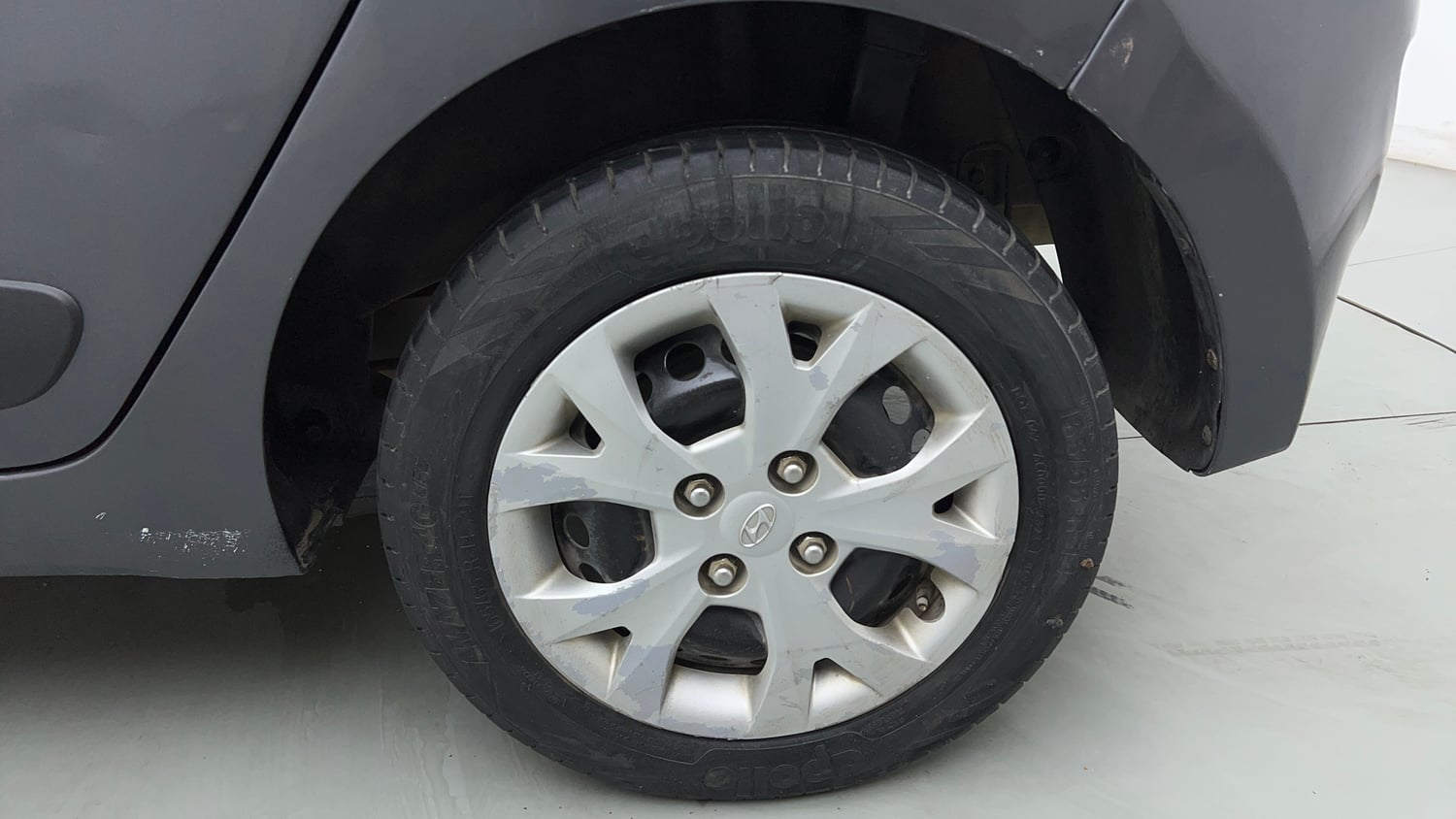 Used 2016 Hyundai Grand i10 Sportz 1.2 Kappa VTVT Petrol Manual tyres LEFT REAR TYRE RIM VIEW