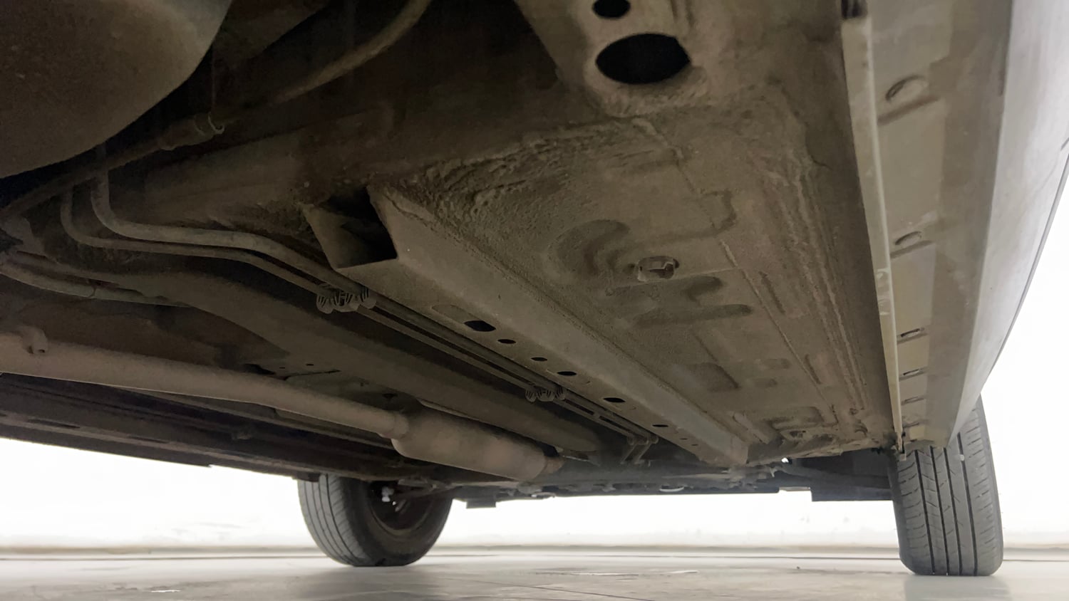 Used 2024 Nissan Magnite XE Petrol Manual extra REAR RIGHT UNDERBODY VIEW
