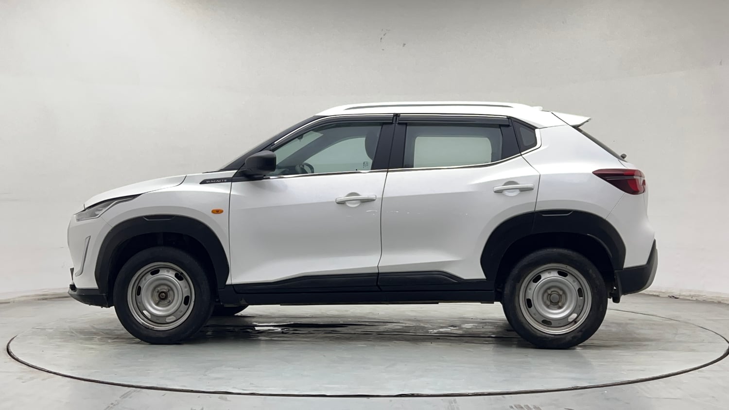 Used 2023 Nissan Magnite XE Petrol Manual exterior LEFT SIDE VIEW