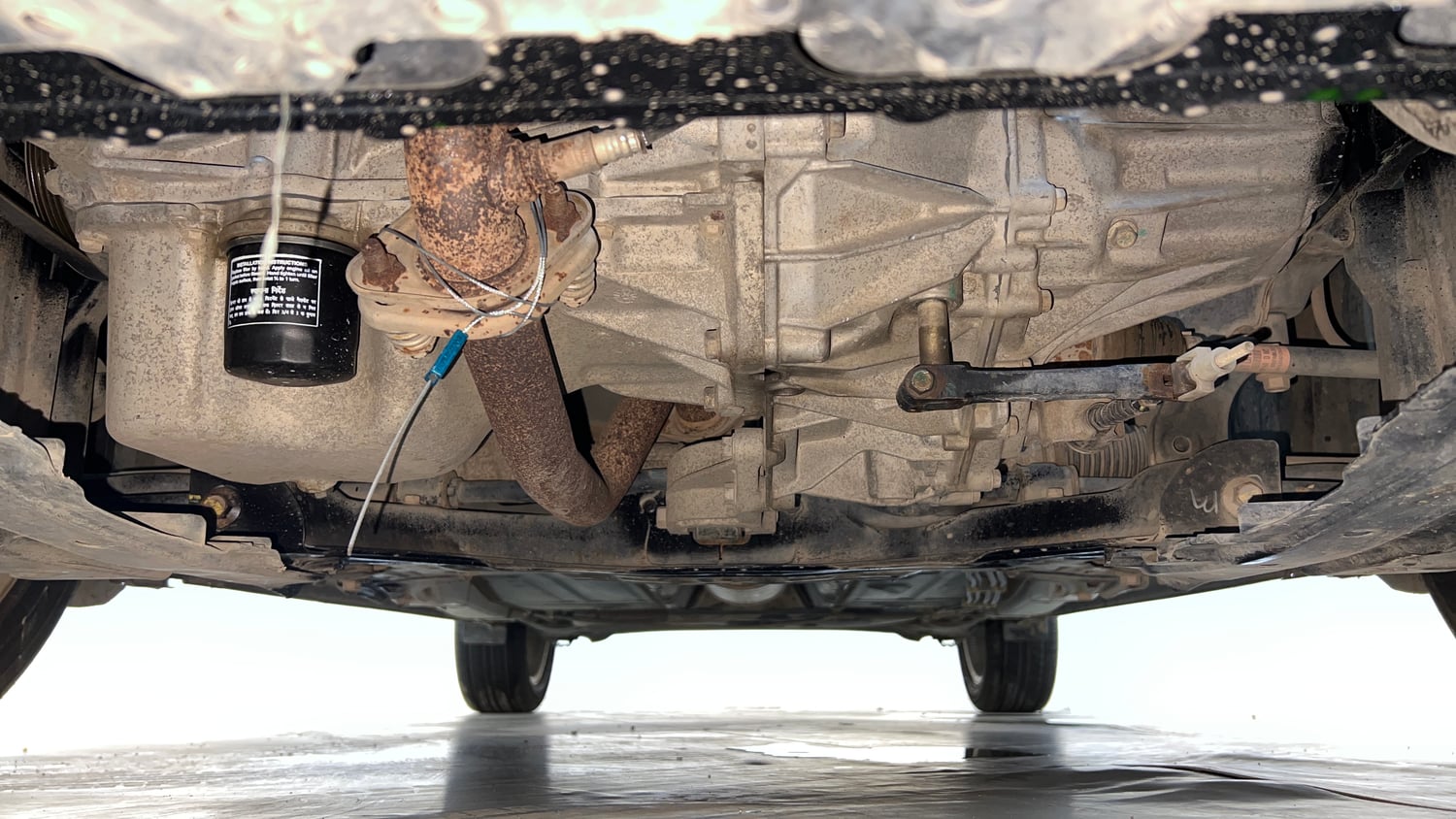 Used 2020 Maruti Suzuki Baleno Zeta Petrol Manual extra FRONT LEFT UNDERBODY VIEW