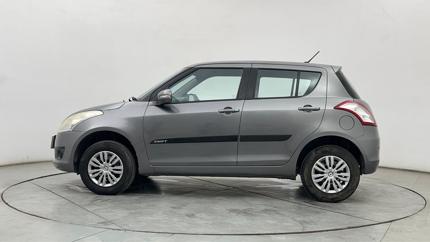 Used 2013 Maruti Suzuki Swift VXi Petrol Manual exterior LEFT SIDE VIEW