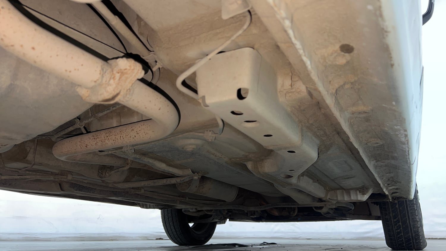 Used 2024 Tata Tiago XTA iCNG Cng Automatic extra REAR RIGHT UNDERBODY VIEW