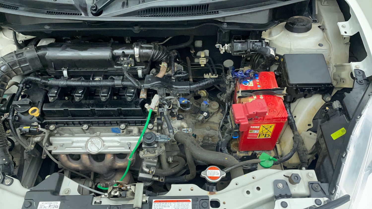 Used 2021 Maruti Suzuki Dzire VXi Petrol Manual engine ENGINE LEFT SIDE VIEW