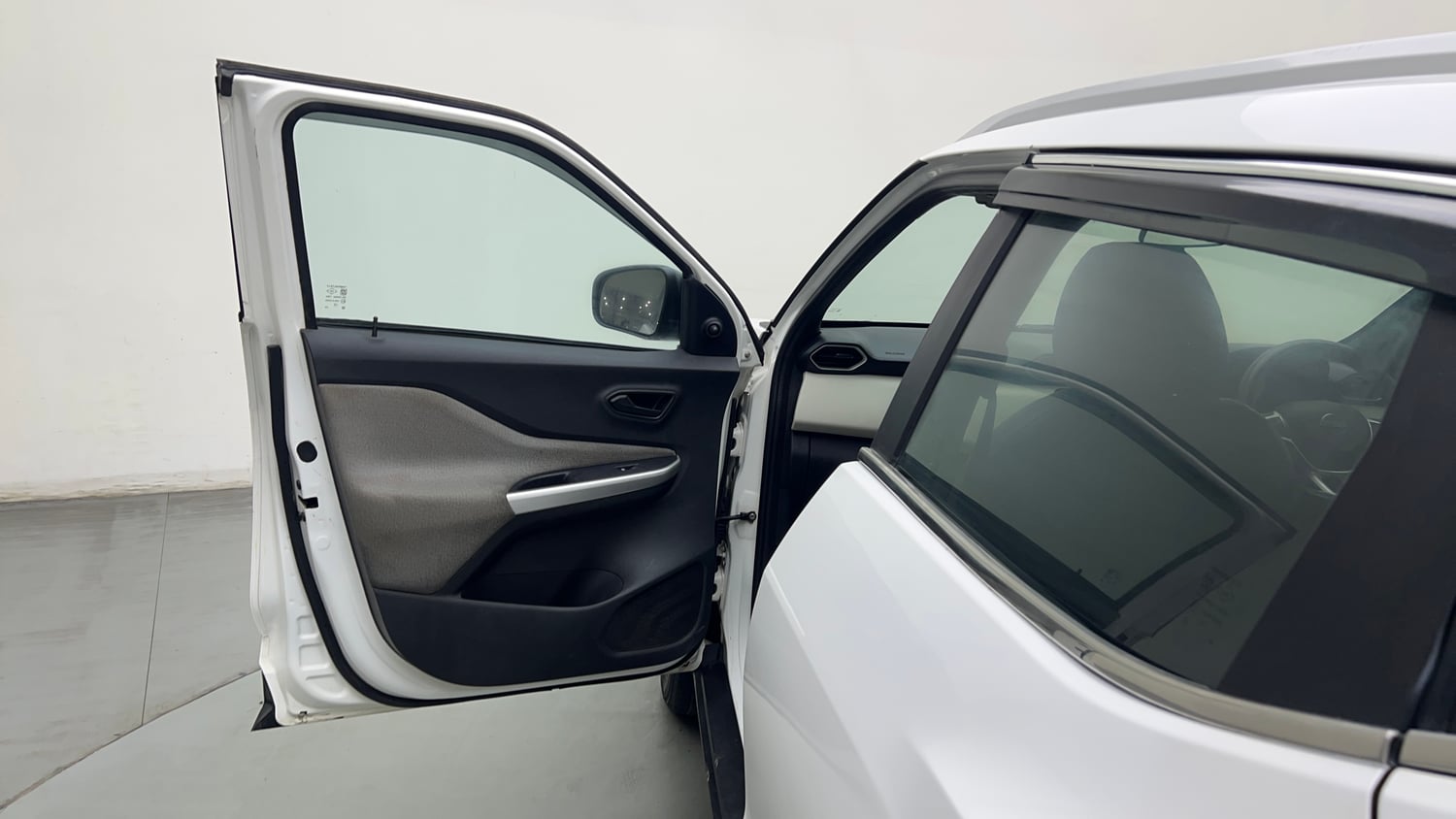 Used 2023 Nissan Magnite XE Petrol Manual interior LEFT FRONT DOOR OPEN VIEW