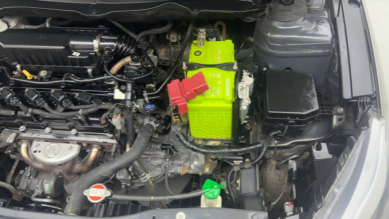 Used 2022 Maruti Suzuki Ciaz Alpha 1.5 Petrol Manual engine ENGINE LEFT SIDE VIEW