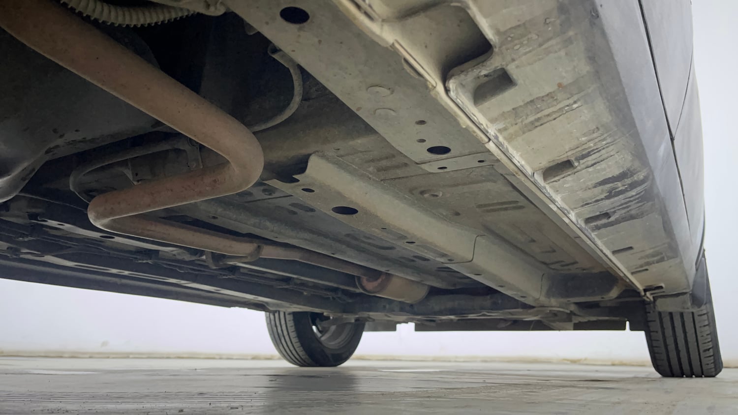 Used 2022 Tata Punch Kaziranga Creative AMT Petrol Automatic extra REAR RIGHT UNDERBODY VIEW