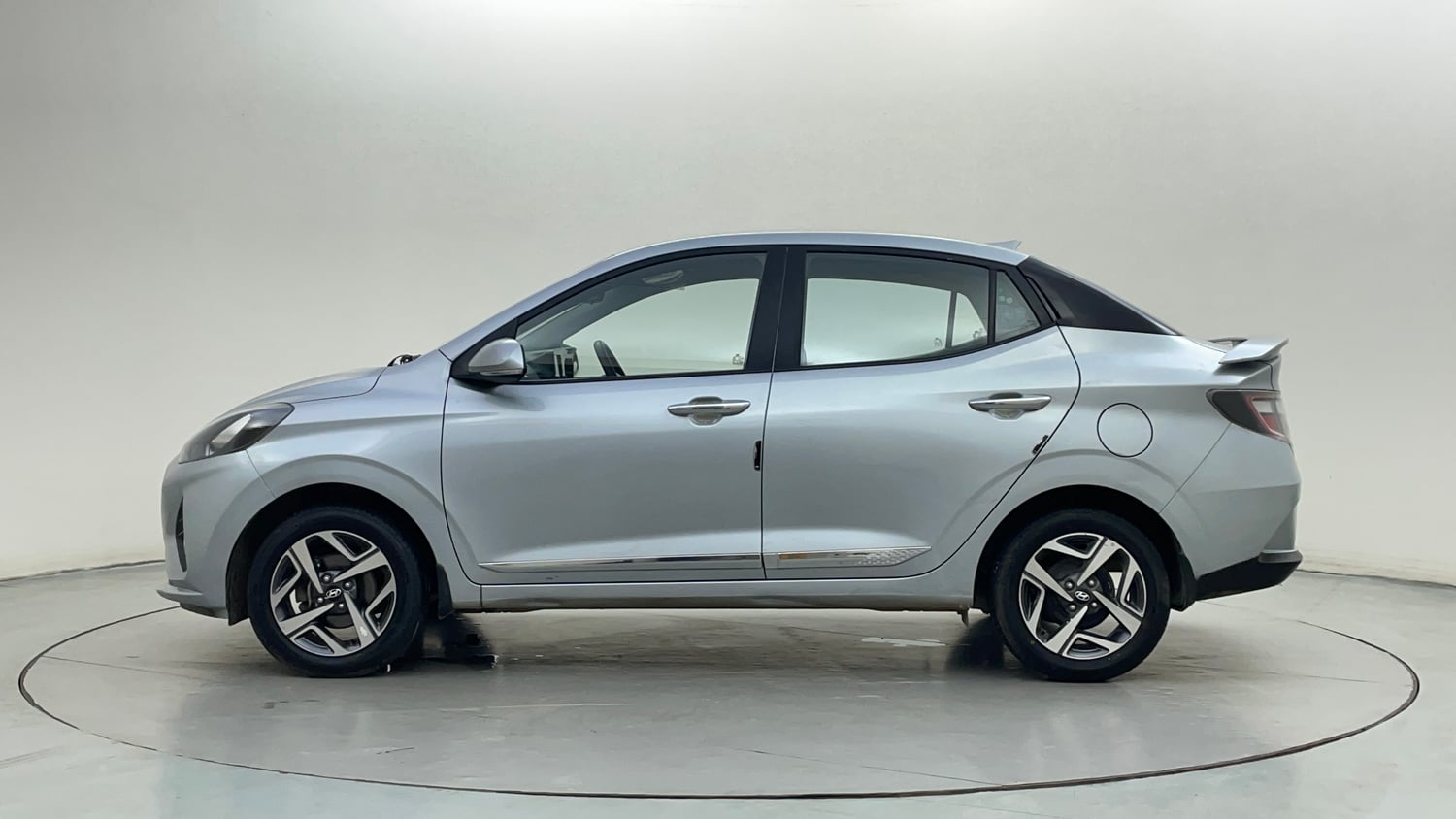 Used 2022 Hyundai Aura SX 1.2 Petrol Petrol Manual exterior LEFT SIDE VIEW