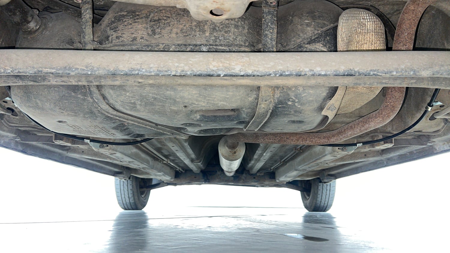 Used 2013 Maruti Suzuki Swift VXi Petrol Manual extra REAR UNDERBODY VIEW (TAKEN FROM REAR)