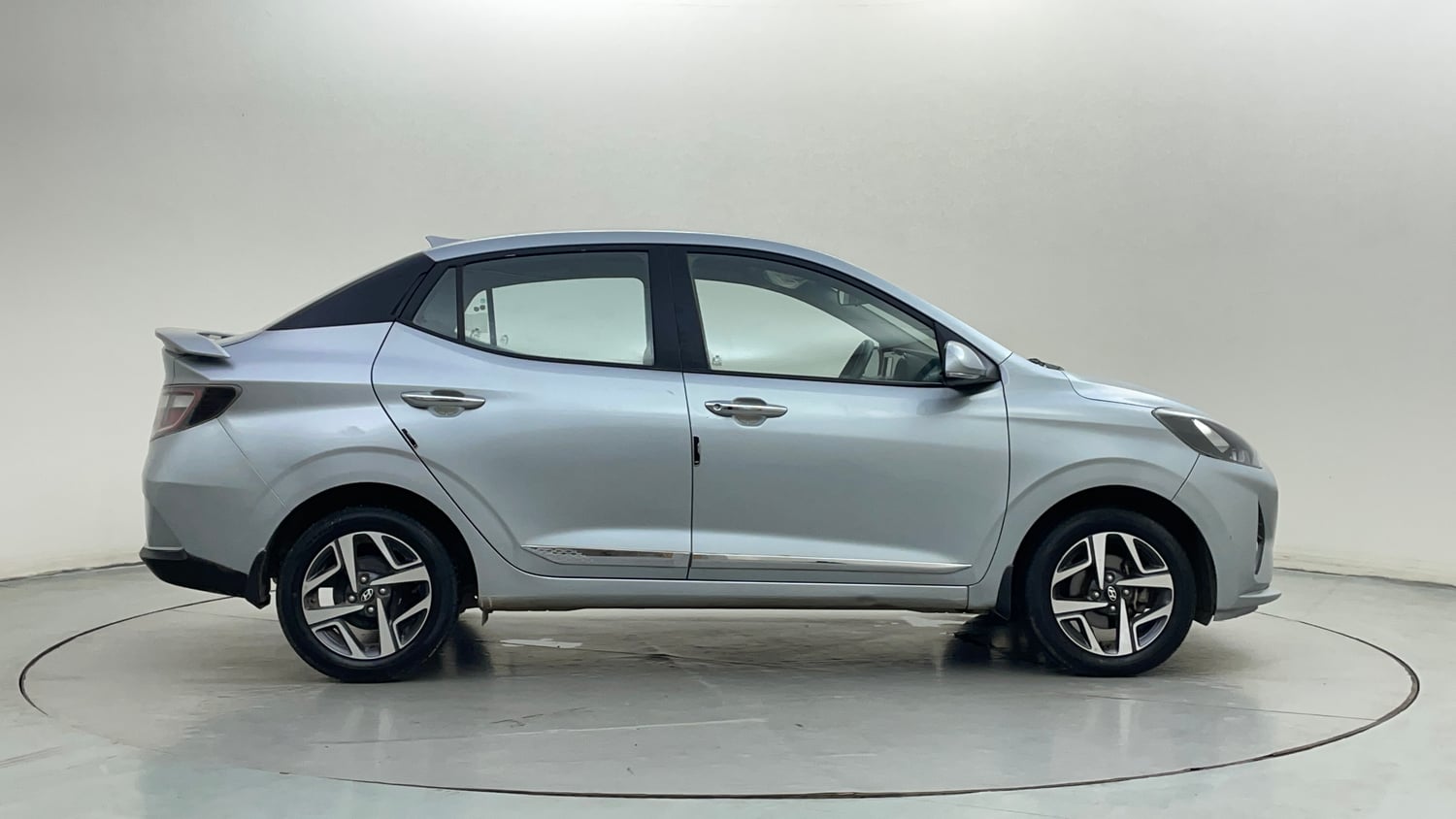 Used 2022 Hyundai Aura SX 1.2 Petrol Petrol Manual exterior RIGHT SIDE VIEW