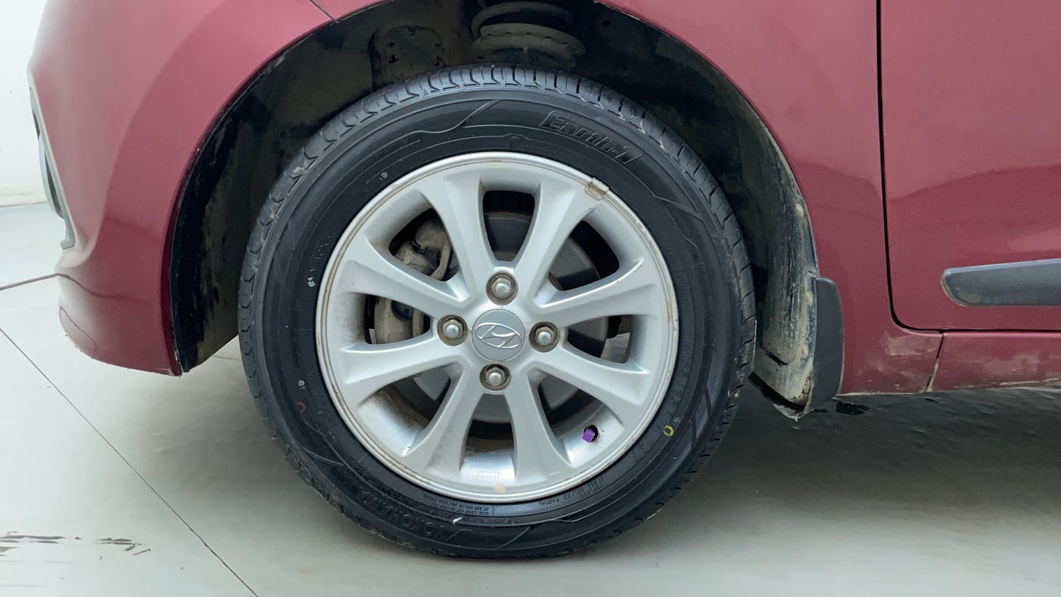 Used 2016 Hyundai Grand i10 Asta AT 1.2 Kappa VTVT Petrol Automatic tyres LEFT FRONT TYRE RIM VIEW