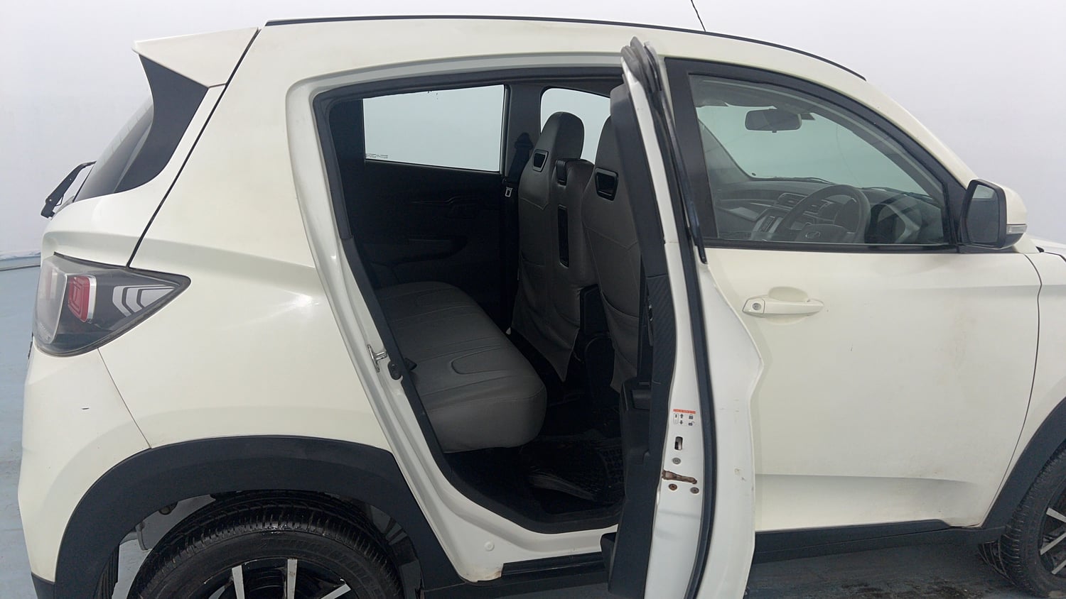 Used 2019 Mahindra KUV100 NXT K8 6 STR Petrol Manual interior RIGHT SIDE REAR DOOR CABIN VIEW