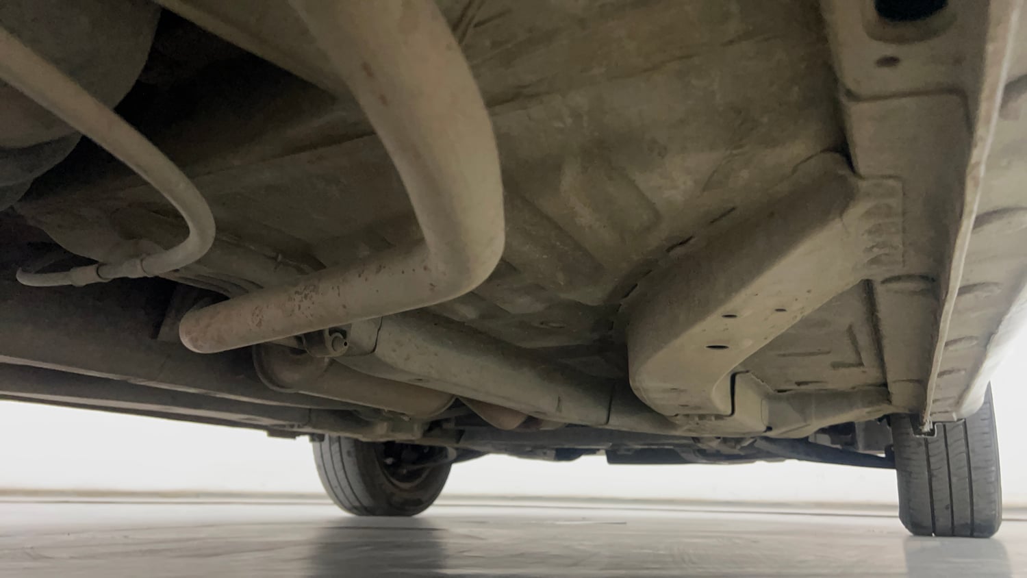 Used 2013 Honda Brio S MT Petrol Manual extra REAR RIGHT UNDERBODY VIEW