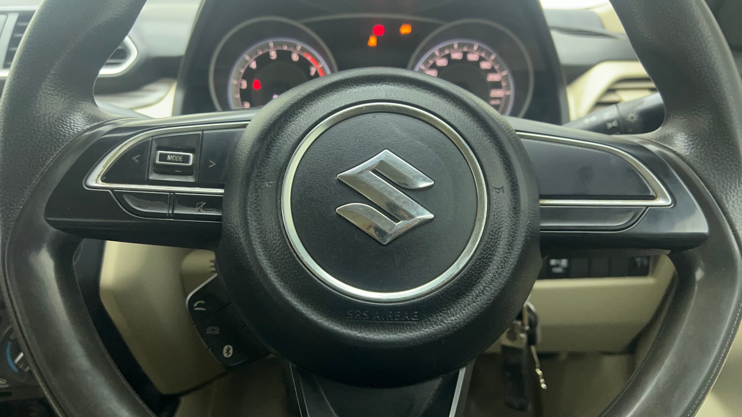 Used 2022 Maruti Suzuki Dzire VXi CNG Cng Manual top_features Steering mounted controls
