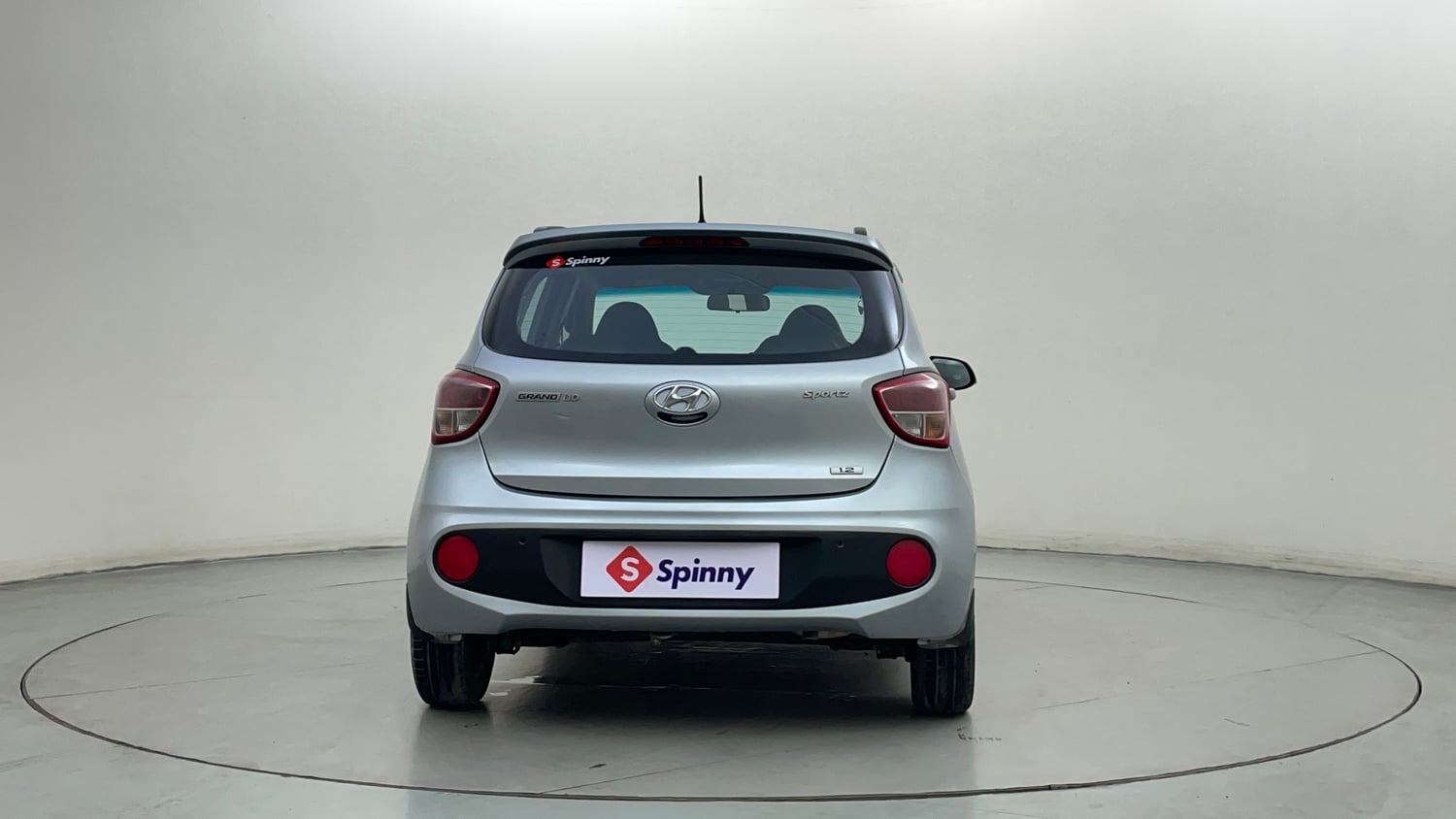Used 2019 Hyundai Grand i10 Sportz 1.2 Kappa VTVT Petrol Manual exterior BACK VIEW