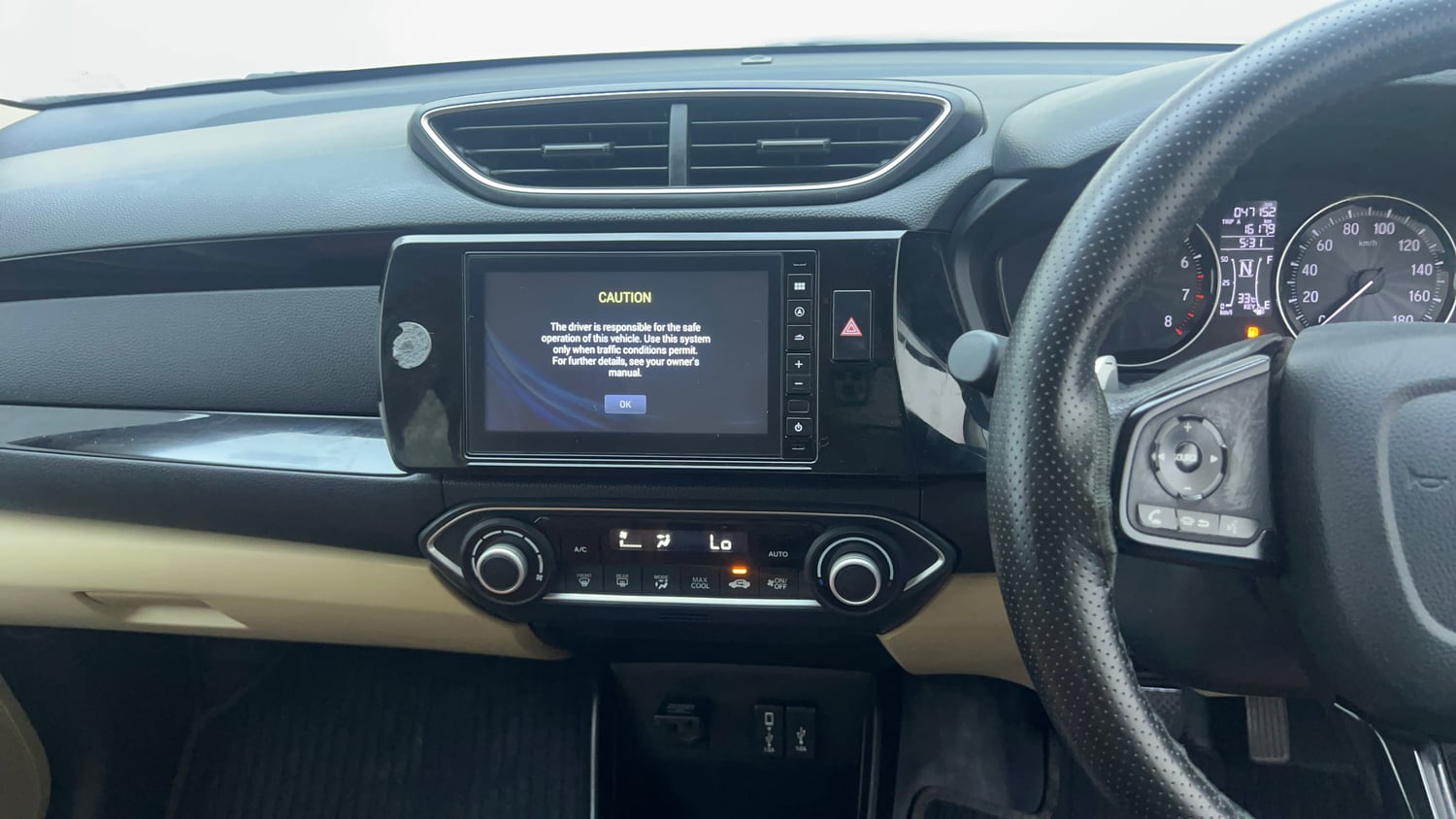 Used 2019 Honda Amaze 1.2 VX CVT Petrol Petrol Automatic top_features Integrated (in-dash) music system