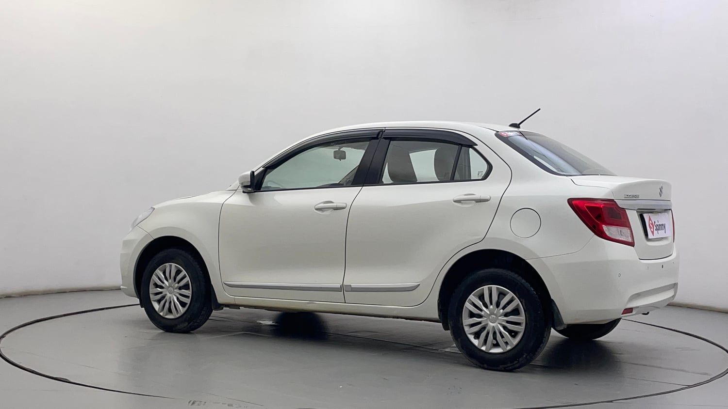 Used 2021 Maruti Suzuki Dzire VXi Petrol Manual exterior LEFT REAR CORNER VIEW