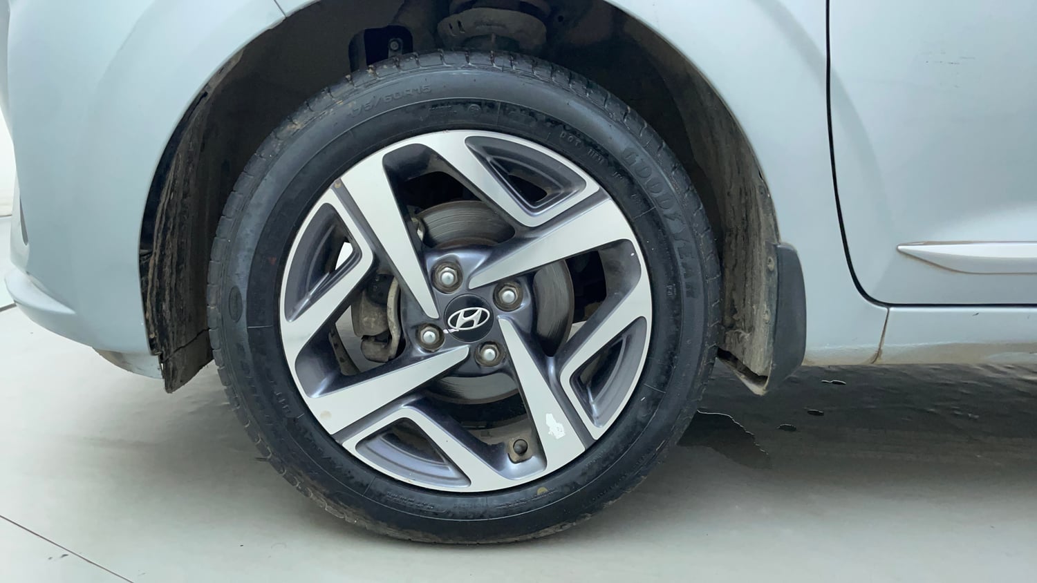 Used 2022 Hyundai Aura SX 1.2 Petrol Petrol Manual tyres LEFT FRONT TYRE RIM VIEW