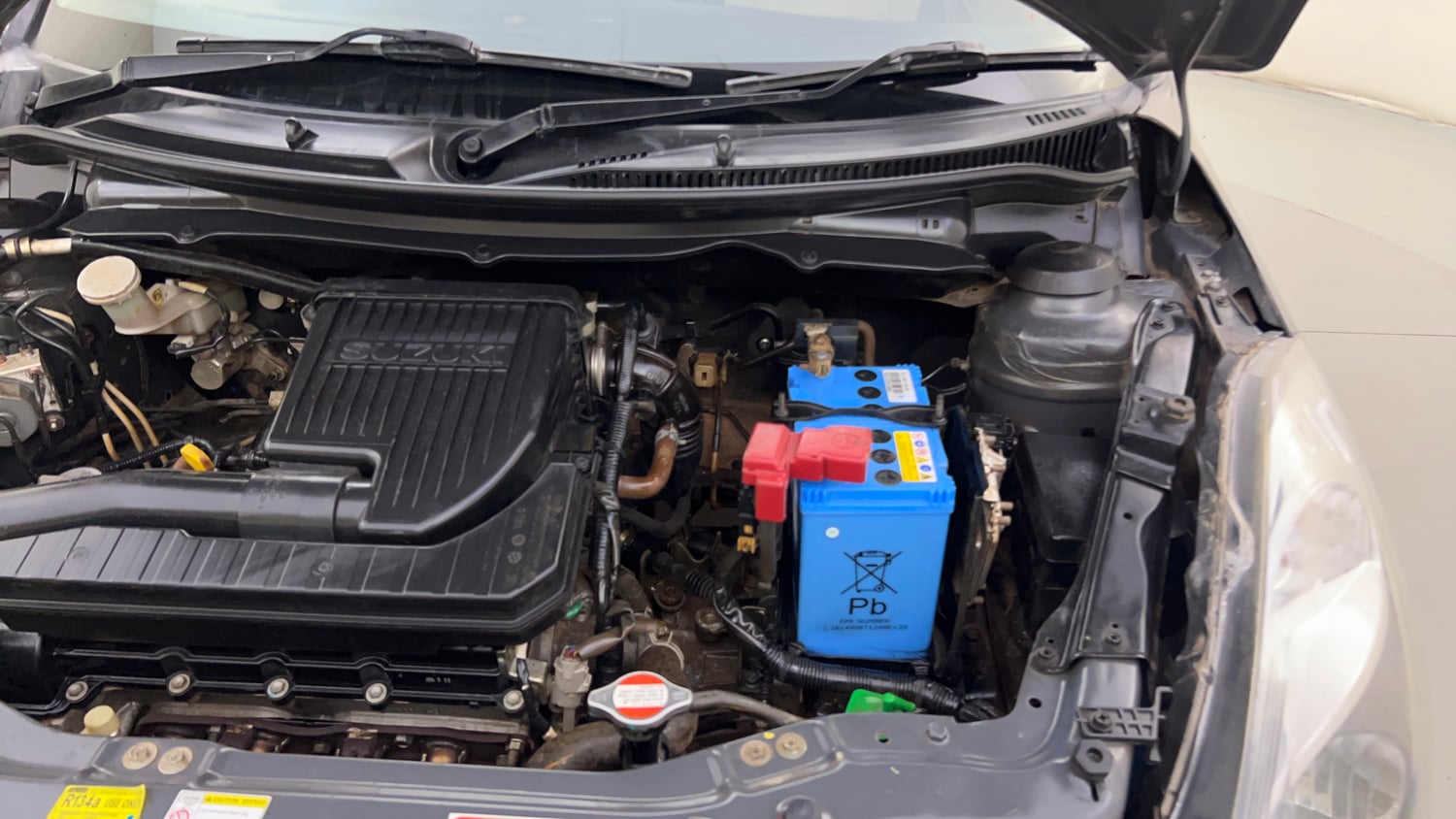 Used 2017 Maruti Suzuki Swift Dzire VXI (O) Petrol Manual engine ENGINE LEFT SIDE HINGE & APRON VIEW
