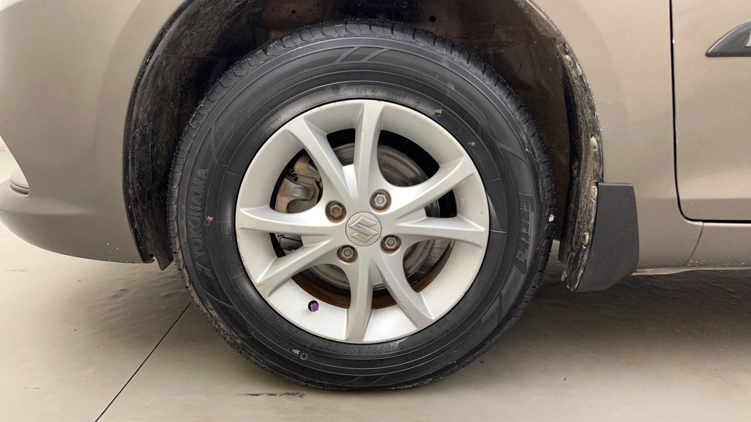 Used 2017 Maruti Suzuki Swift Dzire VXI (O) Petrol Manual tyres LEFT FRONT TYRE RIM VIEW