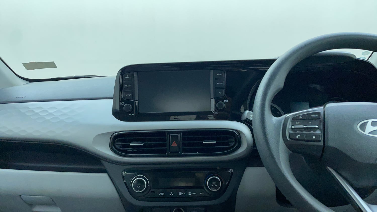 Used 2023 Hyundai Grand i10 Nios Sportz 1.2 Kappa VTVT Petrol Manual interior MUSIC SYSTEM & AC CONTROL VIEW