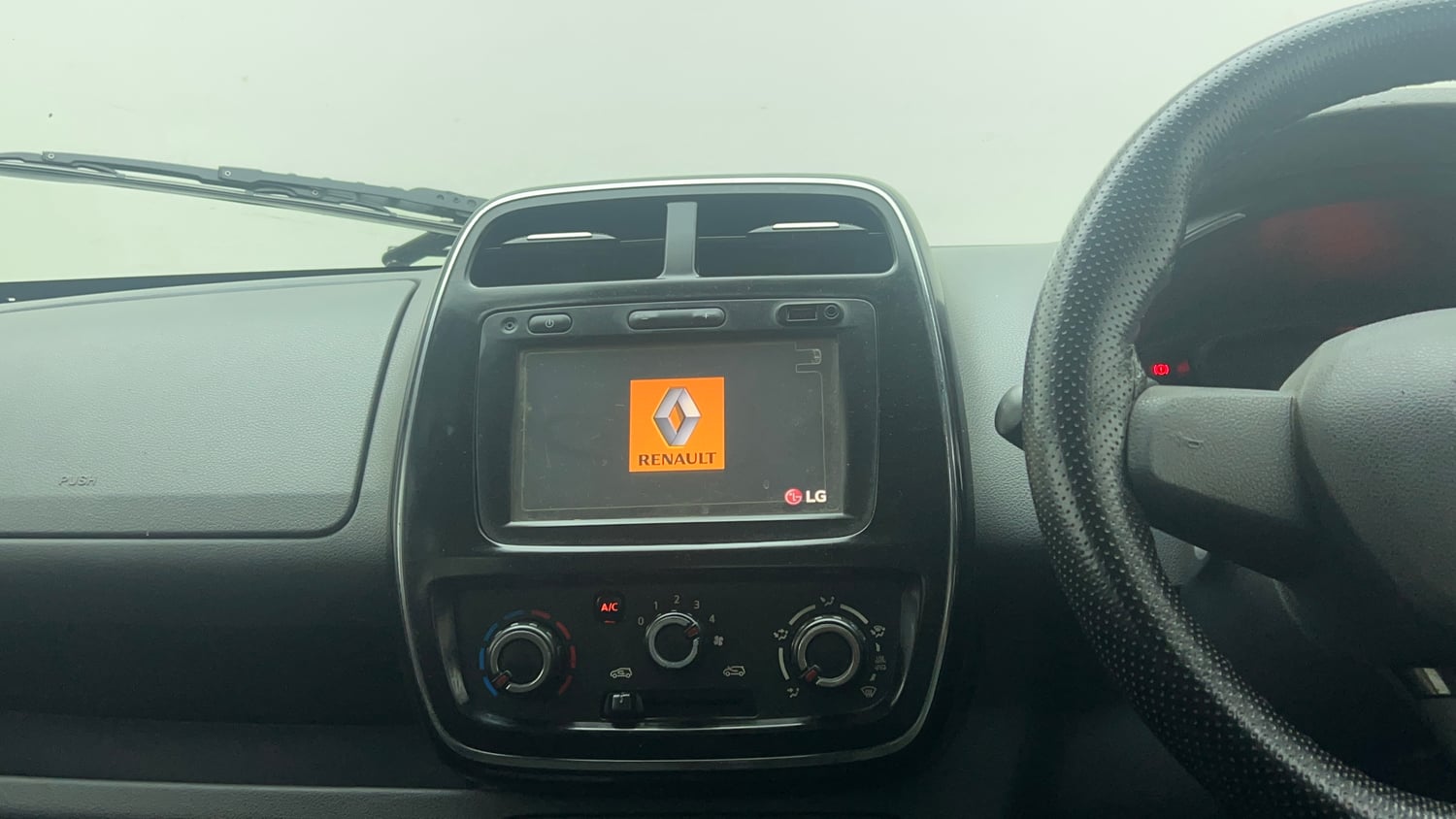 Used 2016 Renault Kwid RXT Petrol Manual top_features Integrated (in-dash) music system