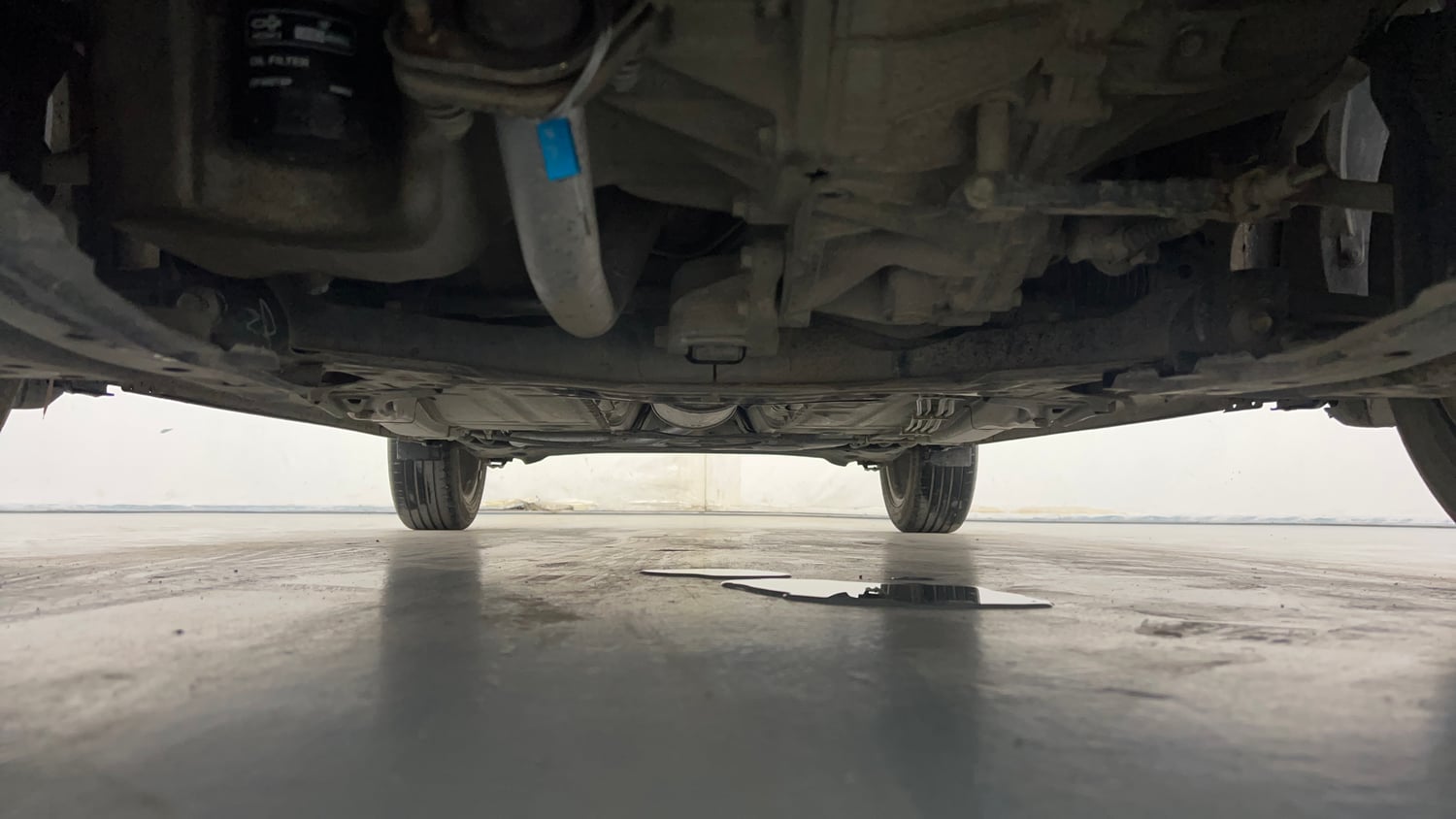 Used 2021 Maruti Suzuki Baleno Zeta Petrol Manual extra FRONT LEFT UNDERBODY VIEW