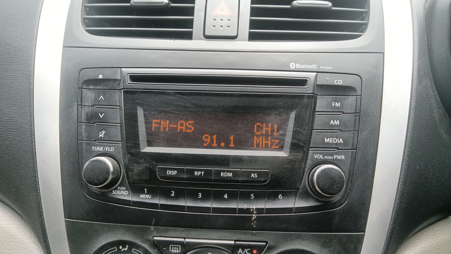 Used 2015 Maruti Suzuki Celerio ZXi Petrol Manual top_features Integrated (in-dash) music system