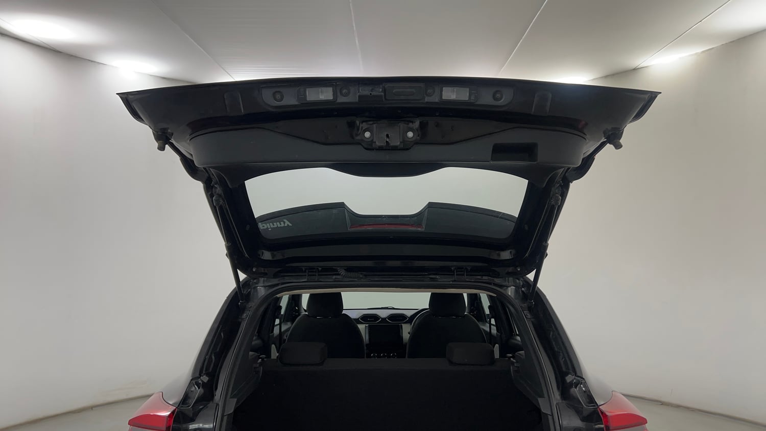 Used 2024 Nissan Magnite XE Petrol Manual interior DICKY DOOR OPEN VIEW