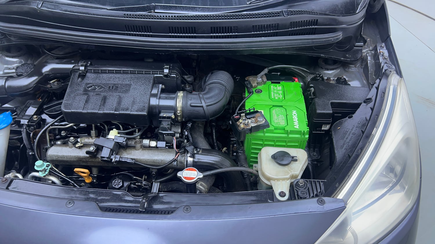 Used 2017 Hyundai Grand i10 Sportz (O) U2 1.2 CRDi Diesel Manual engine ENGINE LEFT SIDE VIEW