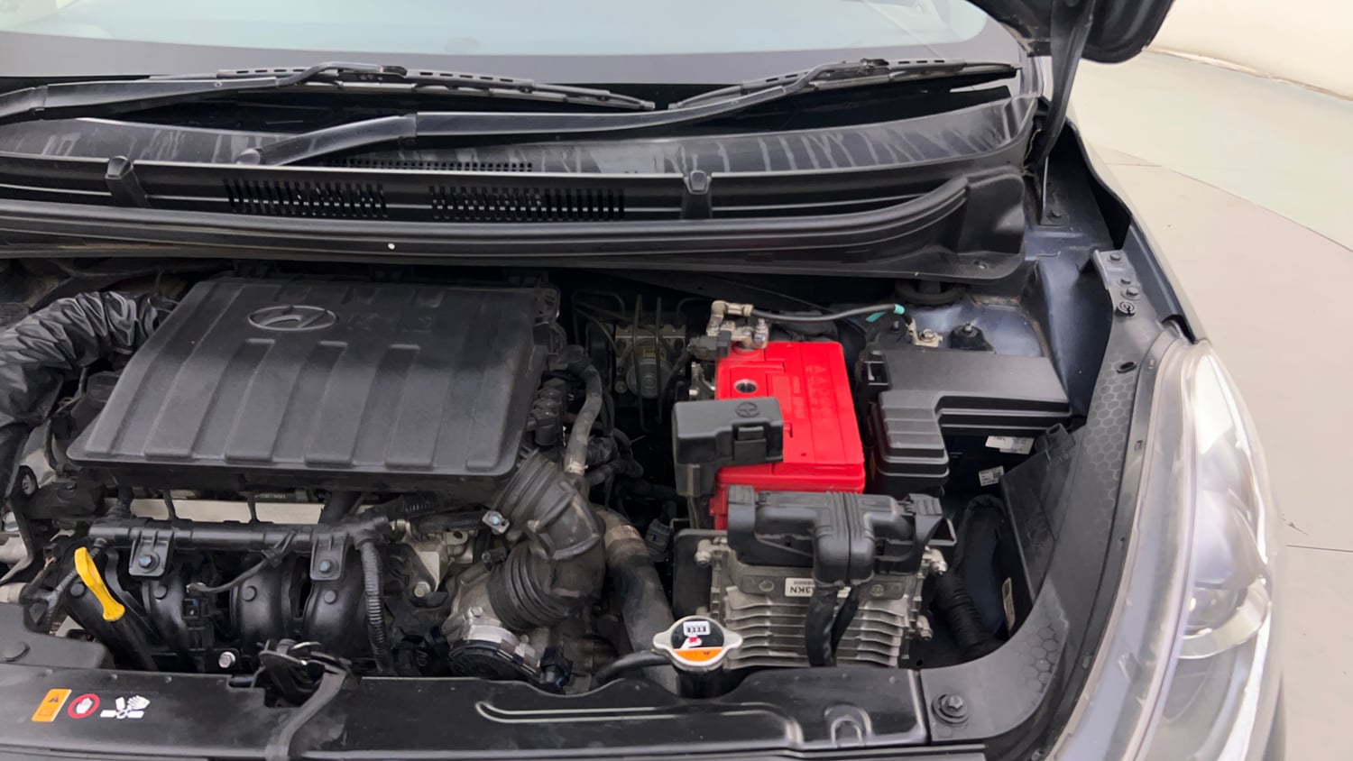 Used 2021 Hyundai Grand i10 Nios Asta AMT 1.2 Kappa VTVT Petrol Automatic engine ENGINE LEFT SIDE HINGE & APRON VIEW