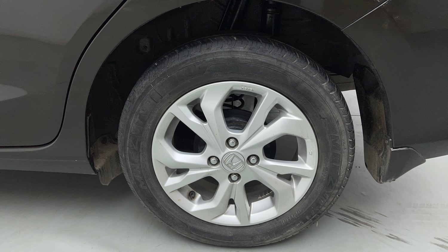 Used 2021 Honda Amaze 1.2 VX MT Petrol Petrol Manual tyres LEFT REAR TYRE RIM VIEW