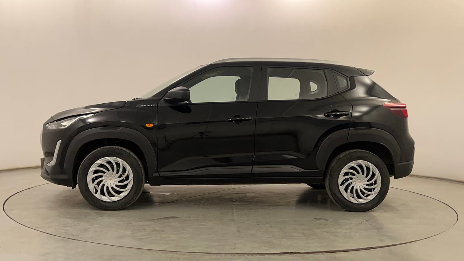 Used 2024 Nissan Magnite XE Petrol Manual exterior LEFT SIDE VIEW
