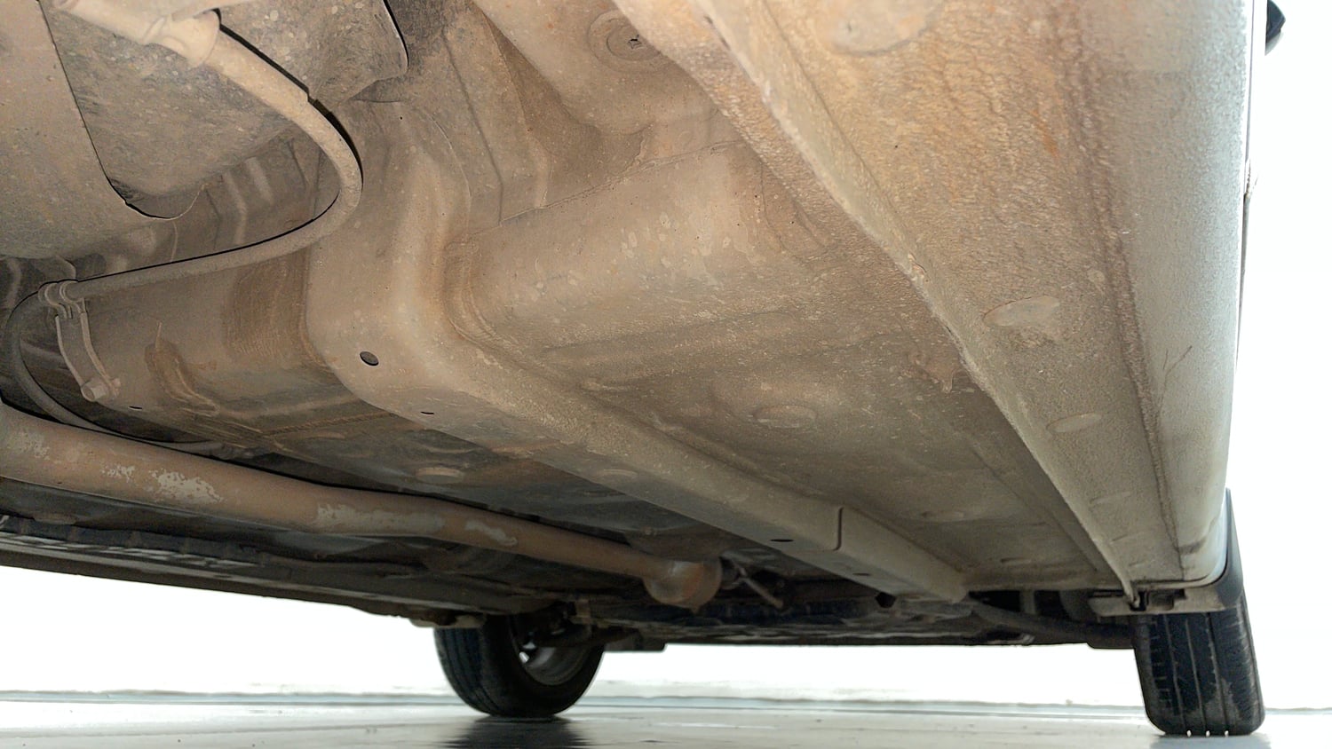 Used 2022 Hyundai Aura SX 1.2 Petrol Petrol Manual extra REAR RIGHT UNDERBODY VIEW