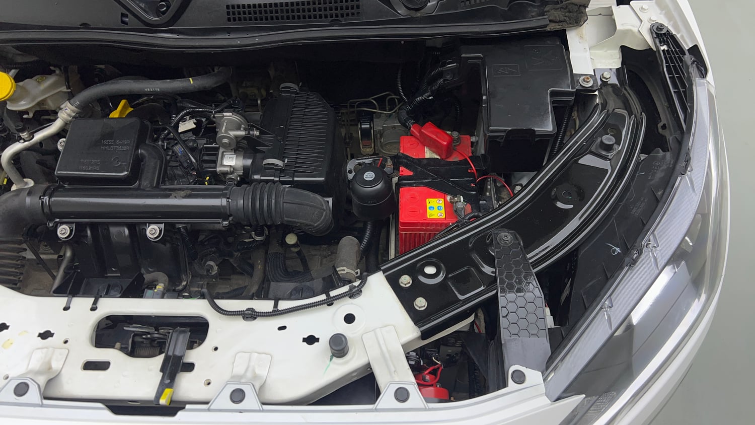Used 2023 Nissan Magnite XE Petrol Manual engine ENGINE LEFT SIDE VIEW