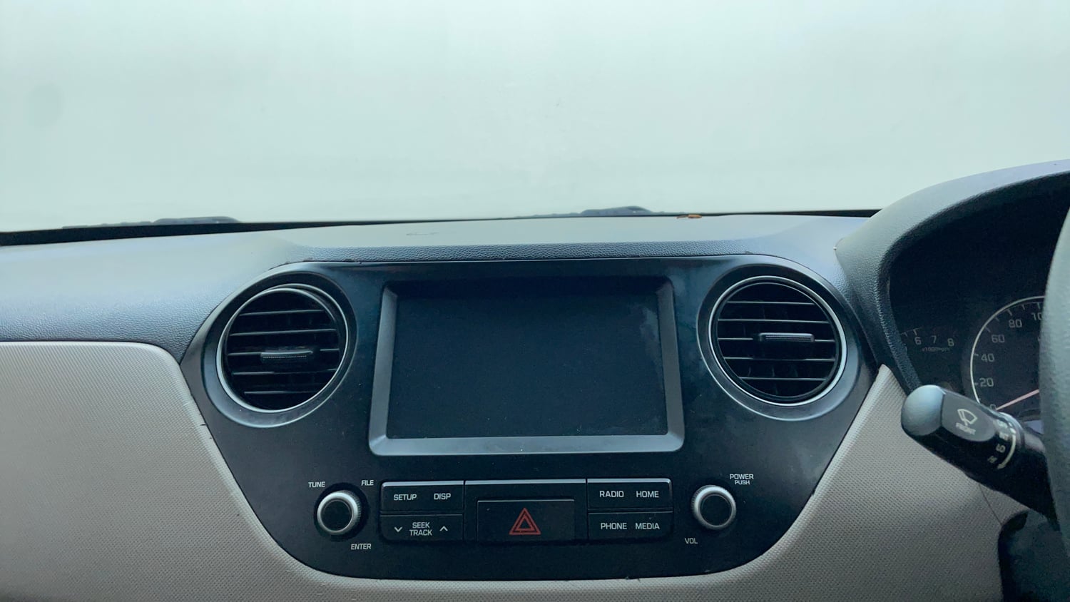 Used 2019 Hyundai Grand i10 Sportz 1.2 Kappa VTVT Petrol Manual top_features Integrated (in-dash) music system
