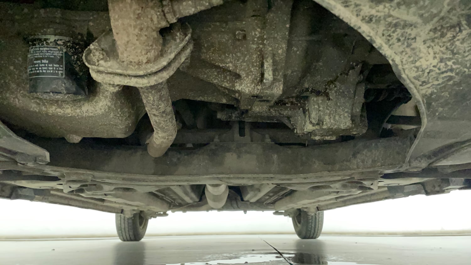 Used 2014 Maruti Suzuki Swift VXI CNG (Outside Fitted) Cng Manual extra FRONT LEFT UNDERBODY VIEW