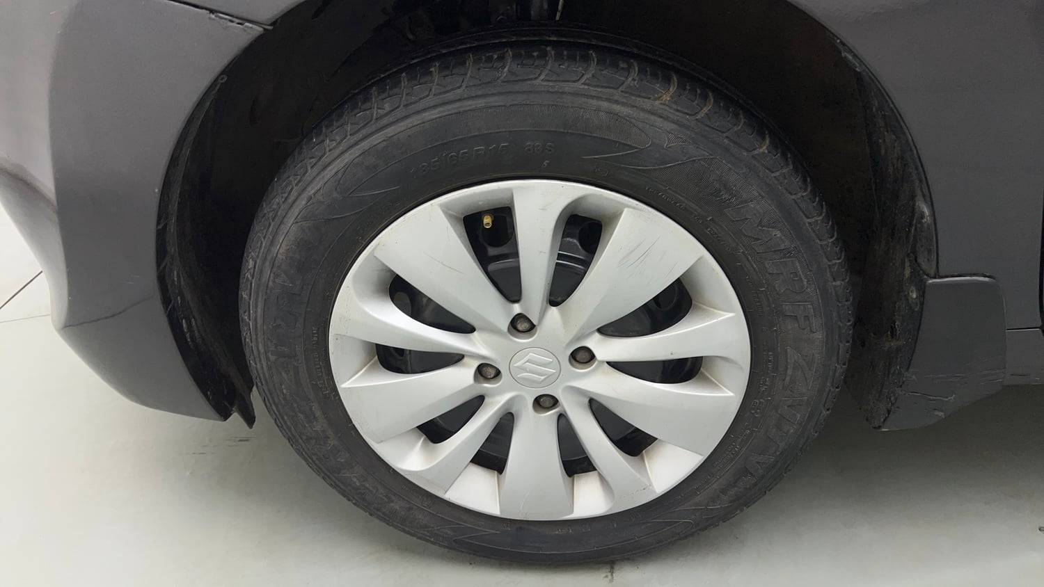 Used 2018 Maruti Suzuki Baleno Delta 1.2 Petrol Manual tyres LEFT FRONT TYRE RIM VIEW