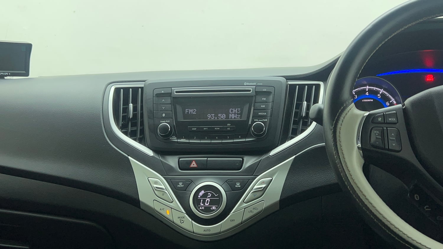 Used 2018 Maruti Suzuki Baleno Delta 1.2 Petrol Manual top_features Integrated (in-dash) music system