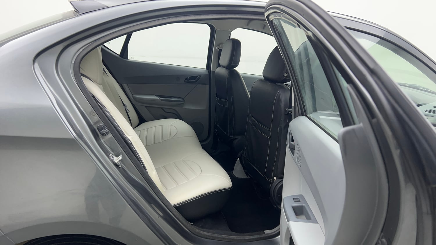 Used 2024 Tata Tigor XM iCNG Cng Manual interior RIGHT SIDE REAR DOOR CABIN VIEW