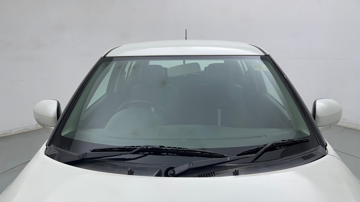 Used 2017 Maruti Suzuki Swift Lxi (O) Petrol Manual exterior FRONT WINDSHIELD VIEW